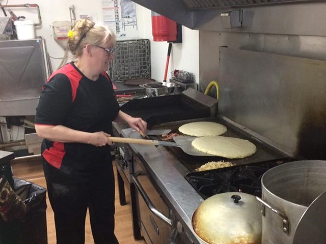 Chef making giant pancakes